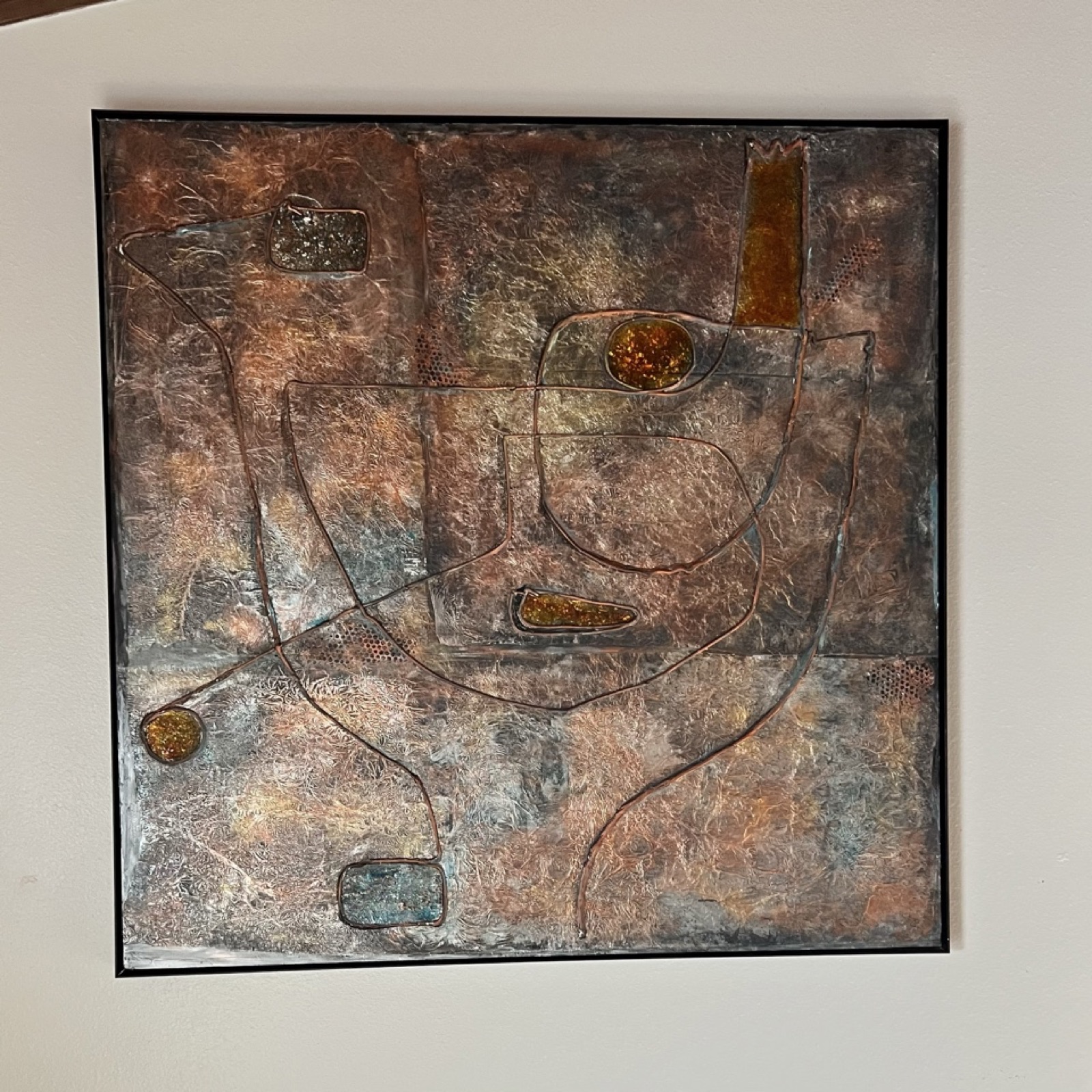Abstract textured painting in copper, bronze and amber with inlaid golden circles